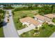 Single-Gathering home with tile roof and landscaped yard at 8216 Parkside Dr, Englewood, FL 34224
