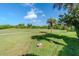 Enjoy tranquil views of the golf course from this picturesque backyard setting at 8216 Parkside Dr, Englewood, FL 34224