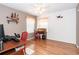 Home office with hardwood floors and window at 8216 Parkside Dr, Englewood, FL 34224