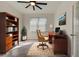 Home office features built-in shelving and a comfortable work area at 2232 Bonito Way, Port Charlotte, FL 33953