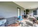 Covered back porch with plenty of space for relaxing and storage at 13401 Galveston Ave, Port Charlotte, FL 33981