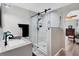 Updated bathroom with double vanity, large shower, and modern fixtures at 13401 Galveston Ave, Port Charlotte, FL 33981