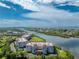 Aerial view of waterfront community with lush landscaping at 11100 Hacienda Del Mar Blvd # 202, Placida, FL 33946