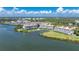 Bird's-eye view of a tranquil waterfront condo community at 11100 Hacienda Del Mar Blvd # 202, Placida, FL 33946