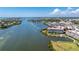 Aerial view of waterfront property, showcasing building and landscaping at 11100 Hacienda Del Mar Blvd # 202, Placida, FL 33946