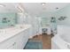 Large Primary bathroom with a soaking tub and walk-in shower at 11100 Hacienda Del Mar Blvd # 202, Placida, FL 33946