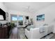 Living room with water views and comfortable seating at 11100 Hacienda Del Mar Blvd # 202, Placida, FL 33946