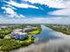 Luxury condo building with beautiful landscaping and waterfront access at 11100 Hacienda Del Mar Blvd # 202, Placida, FL 33946