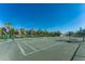 Two well-maintained tennis courts with surrounding fencing at 11100 Hacienda Del Mar Blvd # 202, Placida, FL 33946