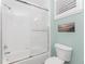 Clean bathroom with a shower/tub combo and white tile at 11100 Hacienda Del Mar Blvd # 202, Placida, FL 33946
