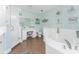 Primary bathroom with soaking tub and double vanity at 11100 Hacienda Del Mar Blvd # 202, Placida, FL 33946