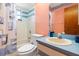 Small bathroom with shower/tub combo and vanity at 7506 Spinnaker Blvd, Englewood, FL 34224