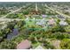 Aerial view showing home's location, lot size, and canal views at 7506 Spinnaker Blvd, Englewood, FL 34224