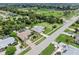 Aerial view of house and surrounding neighborhood at 7506 Spinnaker Blvd, Englewood, FL 34224