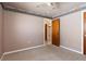 Empty bedroom featuring neutral walls and carpet at 7506 Spinnaker Blvd, Englewood, FL 34224