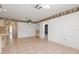 View of dining area with tile floors and access to kitchen and other rooms at 7506 Spinnaker Blvd, Englewood, FL 34224