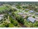 Aerial view of canal-front homes and properties at 7506 Spinnaker Blvd, Englewood, FL 34224