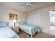 Guest bedroom with twin beds and access to a shared bathroom at 15507 Aqua Cir, Port Charlotte, FL 33981