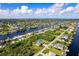 Property aerial view showcasing canal front location and neighborhood at 15507 Aqua Cir, Port Charlotte, FL 33981