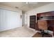 Bright bedroom with double doors and built-in desk at 15507 Aqua Cir, Port Charlotte, FL 33981