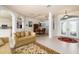 Bright living room with tile floors, comfortable seating, and access to the pool area at 15507 Aqua Cir, Port Charlotte, FL 33981