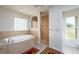 Spa-like bathroom with soaking tub and walk-in shower at 15507 Aqua Cir, Port Charlotte, FL 33981