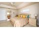 Bright Primary bedroom with ensuite bathroom access and backyard views at 15507 Aqua Cir, Port Charlotte, FL 33981