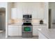 Kitchen features stainless steel appliances and ample storage at 15507 Aqua Cir, Port Charlotte, FL 33981