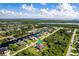 Property aerial view showcasing canal front location and neighborhood at 15507 Aqua Cir, Port Charlotte, FL 33981