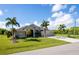 Single-Gathering home with three-car garage and palm trees at 15507 Aqua Cir, Port Charlotte, FL 33981