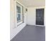 Enclosed lanai with window and door access at 317 E Green St, Englewood, FL 34223