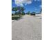 Residential street view with homes and trees at 317 E Green St, Englewood, FL 34223