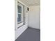 Enclosed lanai with window and door access at 317 E Green St, Englewood, FL 34223