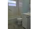 Clean bathroom with shower/tub combo, toilet and vanity at 317 E Green St, Englewood, FL 34223