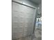 White paneled closet with ample storage space at 13342 Commonwealth Ave, Port Charlotte, FL 33981