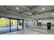 Open concept kitchen with island, stainless steel appliances, and breakfast bar at 13342 Commonwealth Ave, Port Charlotte, FL 33981