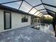 Relaxing pool and patio area with covered lanai at 13342 Commonwealth Ave, Port Charlotte, FL 33981