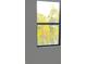 Window view of lush greenery and natural landscape at 13342 Commonwealth Ave, Port Charlotte, FL 33981