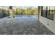 Relaxing pool area with paver deck and screened enclosure at 13342 Commonwealth Ave, Port Charlotte, FL 33981