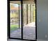 Private screened patio with pavers and water view at 13342 Commonwealth Ave, Port Charlotte, FL 33981