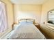 Cozy bedroom with double bed and mirrored dresser at 324 Santurce Ave, North Port, FL 34287