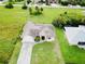 Aerial view of house and surrounding landscape at 324 Santurce Ave, North Port, FL 34287