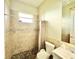 Clean bathroom with shower, toilet and vanity at 324 Santurce Ave, North Port, FL 34287