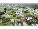 Aerial view of a residential neighborhood with various homes at 324 Santurce Ave, North Port, FL 34287
