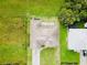Aerial view of house and surrounding landscape at 324 Santurce Ave, North Port, FL 34287