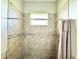 Clean bathroom with shower, toilet and vanity at 324 Santurce Ave, North Port, FL 34287