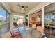 Spacious screened balcony with outdoor furniture and lovely nature views at 3363 Grand Vista Ct # 203, Port Charlotte, FL 33953