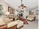 Spacious living area with an open floor plan, showing access to the kitchen at 3363 Grand Vista Ct # 203, Port Charlotte, FL 33953