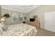 Main bedroom with king-size bed, and ample closet space at 3363 Grand Vista Ct # 203, Port Charlotte, FL 33953