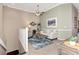 Relaxing living area featuring a comfy sofa and ceiling fan at 3363 Grand Vista Ct # 203, Port Charlotte, FL 33953